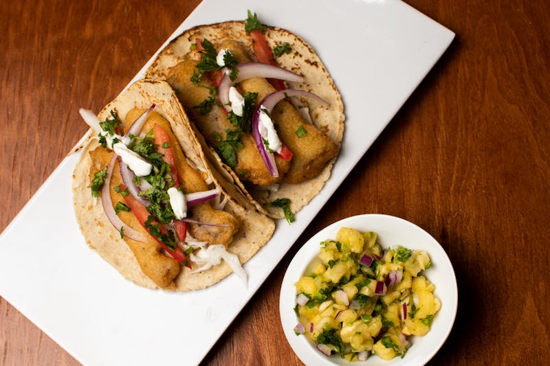 Baja fish tacos with crunchy slaw and creamy sauce